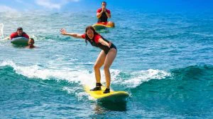 Group Surfing Lesson at Poʻipū Beach
