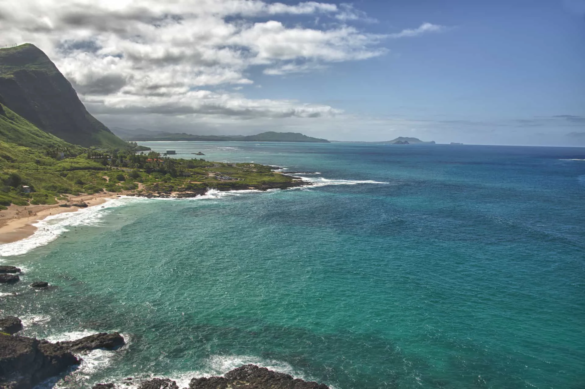 Aerial view of the east coast of Oahu, Hawaii with green cliffs and ocean