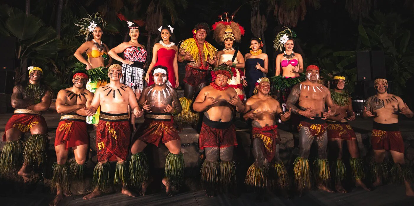 Polynesian performers of Chief's Luau on stage in traditional costume, Oahu, Hawaii