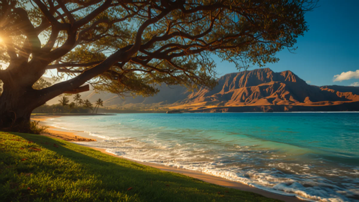 Gentle beginner waves at Launiupoko Beach Park near Lahaina on west Maui, with the West Maui mountains rising behind