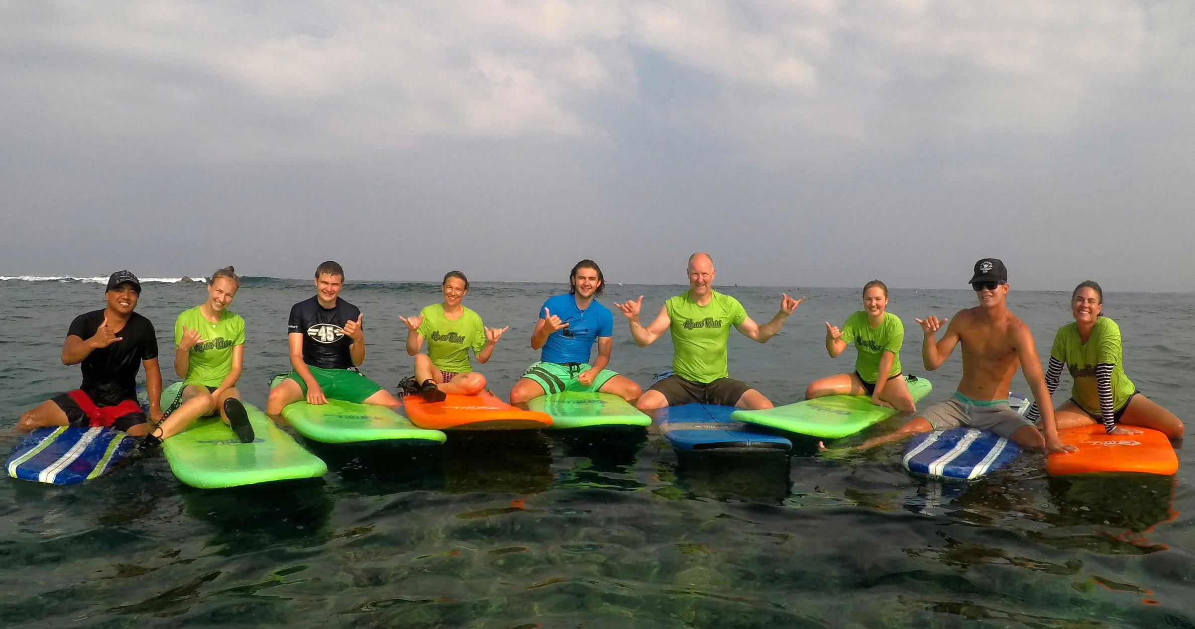 Group surf lesson at Kahaluu Beach Park in Kailua-Kona