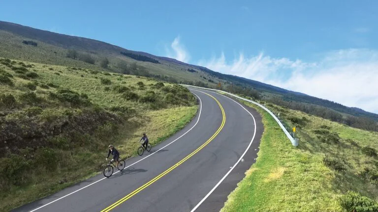 Riders on a self-guided Haleakala downhill bike tour through upcountry Maui
